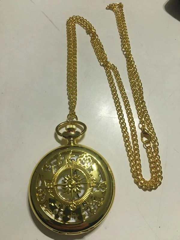 Montre à gousset boussole dorée